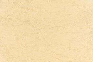 Light yellow color abstract synthetic leather pattern for background, colored texture for design photo