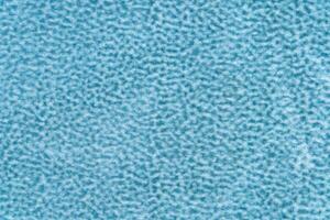 Light blue color velvet with short haired fluffy and soft texture background. sapphire colour velour photo