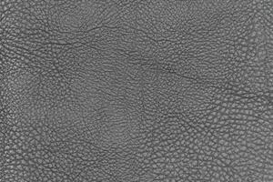 Dark gray color abstract synthetic leather pattern for background. Shade light black colour surface photo
