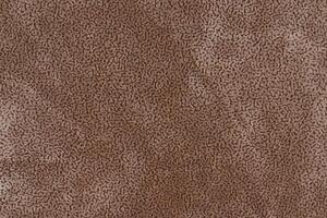 Brown color fabric material with short pile fluffy and soft texture background. Image of tawny cloth photo