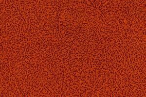 Orange color fabric material with short haired fluffy and soft texture background. Close-up photo