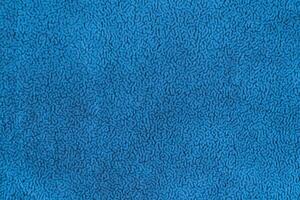 Blue color fabric cloth with short pile fluffy and soft abstract texture vivid background photo