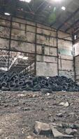 Empty Storehouse Interior For Background. Industrial abandoned building interior in dark colors Vertical video