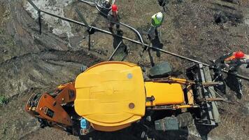 Top view of construction site. Aerial top down view of machinery working at construction site video