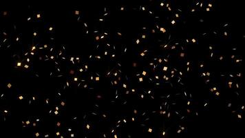 Golden confetti burst - confetti explodes from left and right then double pops and falls glittering to the ground. Festive celebration concept. Overlay with transparent alpha channel. video
