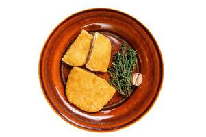 Chicken cordon bleu meat roll cutlet with ham and cheese. Isolated on white background. photo