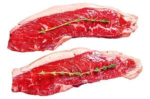 Fresh raw sirloin steak Isolated on white background. Top view. photo