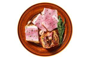 Smoked pork Slab Bacon meat slices on a rustic plate. Isolated, white background. Top view. photo