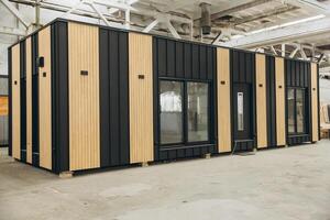 Modular building under construction in a large industrial facility photo