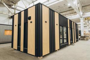 Modern modular house under construction in a factory photo