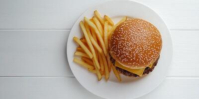 Stack of fries next to a burger on a white plate, culinary photography photo