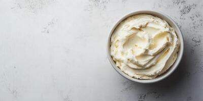 Spread in a small dish with an even surface and no visible toppings, photorealistic food photo