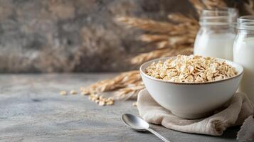 Bowl filled with hot cereal with a jar of milk and spoon nearby, photorealistic food photo