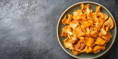 Sliced chanterelle mushrooms arranged in a fan shape on a plate, gastronomy photography photo