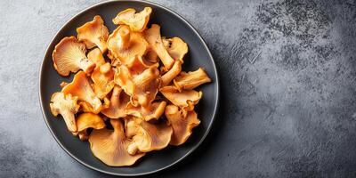 Sliced chanterelle mushrooms arranged in a fan shape on a plate, meal photography photo