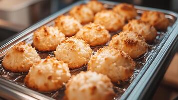 Container of vegan coconut macaroons, neatly stacked and ready for packaging, photorealistic food photo