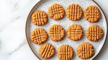 Collection of vegan peanut butter cookies laid out in a circular pattern on a plate, meal photography photo
