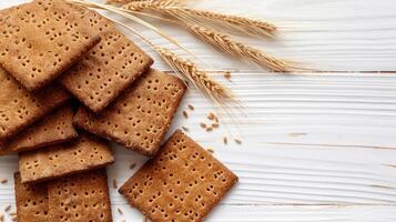 Sugar biscuits on white wooden table top view photo