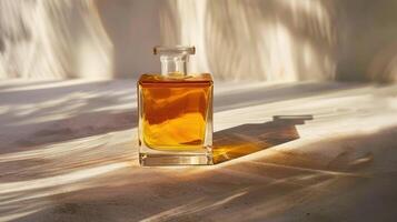 A bottle of oil sitting on a table photo