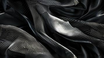 A black and white photo of a fabric with a pattern