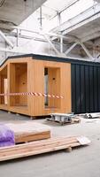Exhibition of new mobile prefabricated modular house. Vertical video