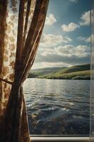 A serene view of hills and water through a patterned curtain. photo