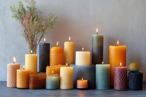 A Collection of Scented Candles with Various Designs and Colors photo