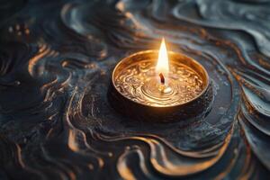 A Single Candle Flame in a Metallic Container with Water and Wavy Patterns photo