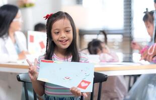 Portrait of special students doing learning activities in a special classroom photo
