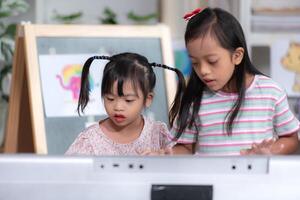 Portrait of special students doing learning activities in a special classroom photo