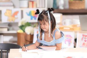 Portrait of special students doing learning activities in a special classroom photo