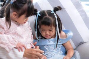 A group of special students doing learning activities in a special classroom photo