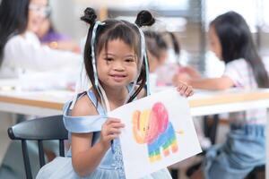 Portrait of special students doing learning activities in a special classroom photo