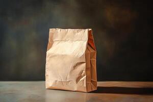 A Single Crumpled Paper Bag on a Dark Background photo