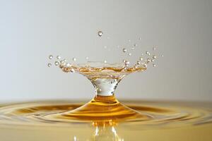 Water Drop Impact Creating a Golden Crown Splash photo