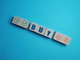 Stock market and investment, check and wrong mark with buy photo