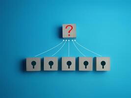 Question mark on wooden block and key to solve the puzzle photo