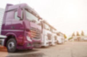 Truckers in the parking lot. The concept of roadside services for the recreation and parking of truckers, blurred, copy space photo