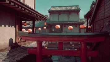 A view of a building with lanterns hanging from it's roof video