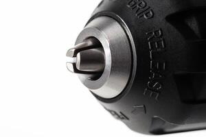 keyless chuck in a drill screwdriver with spindle lock, white background, isolate. Power tools, close-up. Copy space for text photo