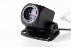 Modern car rear view camera on a white background, close-up, isolate, digital photo