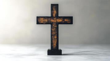 Wooden cross illuminated by soft light creating a serene atmosphere in a peaceful setting photo