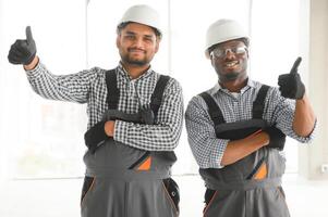 Group of multi ethnic engineer construction site worker meeting at workplace photo