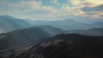 panoramic view of a majestic mountain range from a soaring airplane video