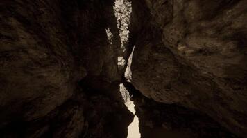 A narrow passage between two large rocks video