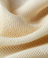 Soft textile with mesh pattern showcasing intricate details photo
