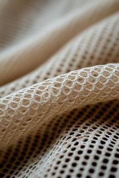 Detailed view of textured fabric showcasing intricate mesh design photo