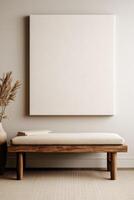 Minimalist interior with a wooden bench and blank canvas photo