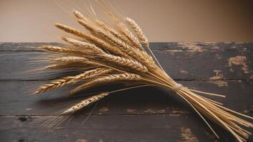 Rustic Dried Wheat Bouquet on Wooden Surface. photo