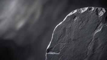 Dark Textured Stone Surface for Background Use. photo